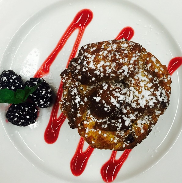 Bourbon Bread Pudding with Strawberry Coulis & Macerated Berries 