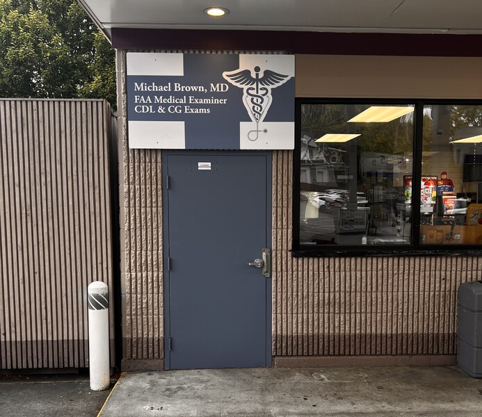 Door to stairs that go up to the office.