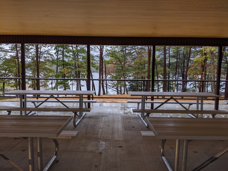 View of reservoir from the ADA accessible large picnic shelter.  There are six picnic tables under the shelter area.